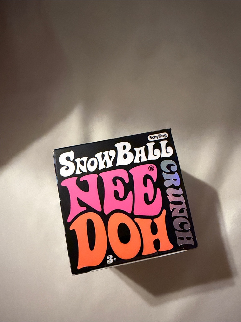 Schylling SnowBall NeeDoh Crunch Sensory Toy - Pink & Orange